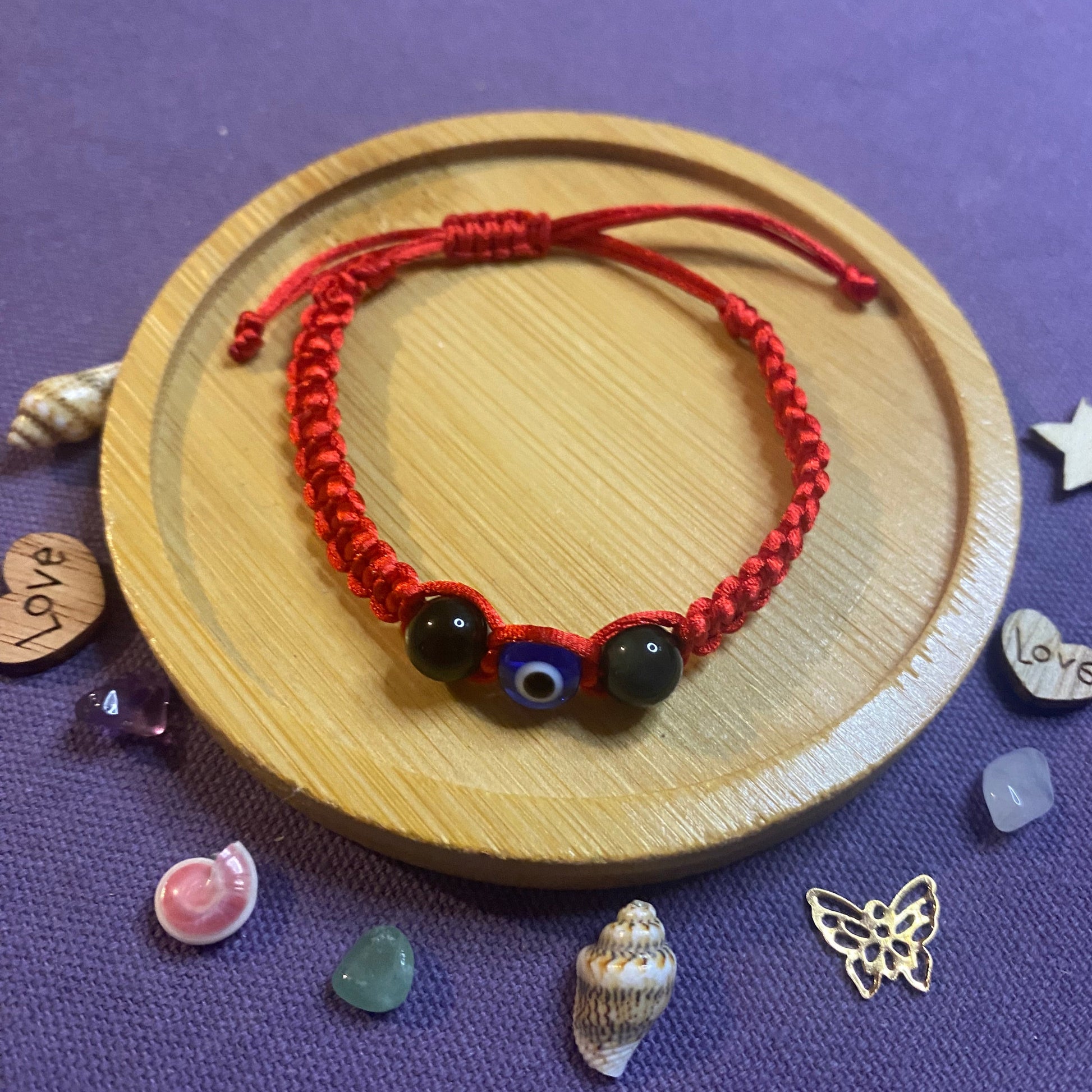 Bracelet macramé de protection avec oeil bleu et pierres naturelle obsidienne arc en ciel